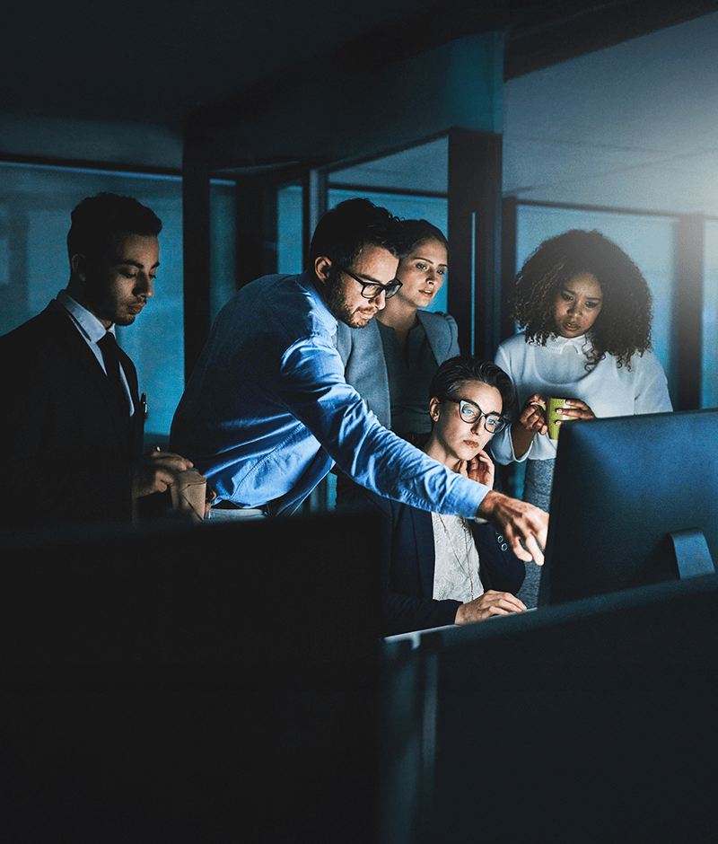 Cross-functional team collaborating to analyse data and drive informed business decisions