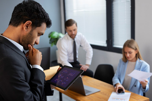 Multiple teams and dependencies in software delivery illustrated through connected workflow gears